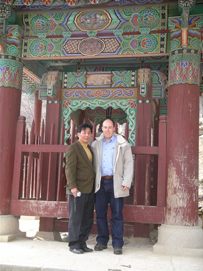 InterNature President, Byung-Jin Lee & Michael outside a traditional Korean building